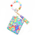 Porte-cartes avec bracelet porte-clés à perles et pompon