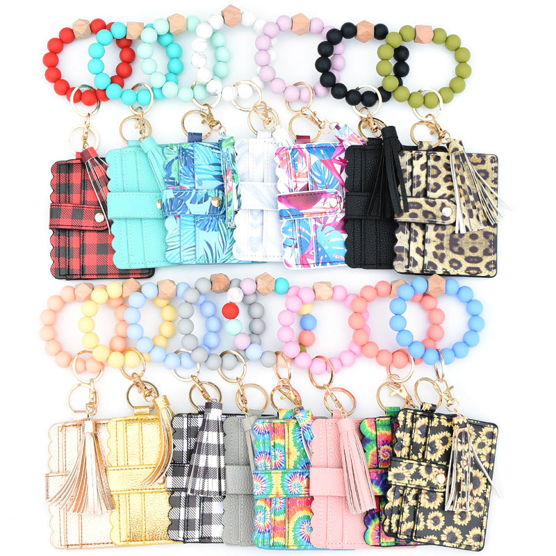 Porte-cartes avec bracelet porte-clés à perles et pompon