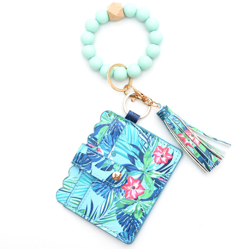 Porte-cartes avec bracelet porte-clés à perles et pompon