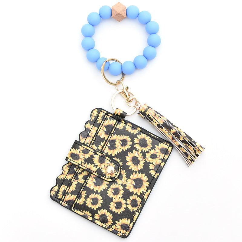 Porte-cartes avec bracelet porte-clés à perles et pompon