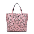 SAC À MAIN À CARREAUX GEOMETRIQUE PLIÉ