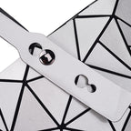 SAC À MAIN À CARREAUX GEOMETRIQUE PLIÉ