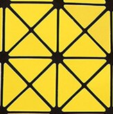 SAC À MAIN À CARREAUX GEOMETRIQUE PLIÉ