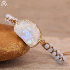 BRACELET À BRELOQUES EN PIERRE DE LUNE TISSÉES
