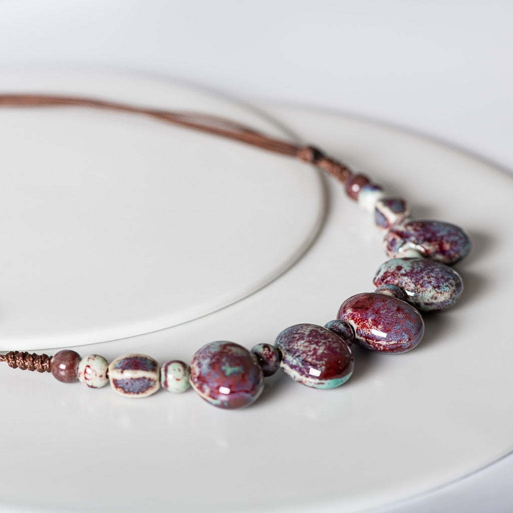 PAVE SHAPED CERAMIC PEARL NECKLACE 