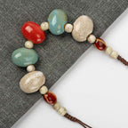 PAVE SHAPED CERAMIC PEARL NECKLACE 