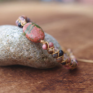 BRACELET UNISEXE EN PERLES DE RHODONITE