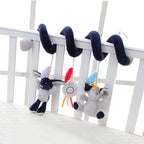 HOCHET EN PELUCHE À SUSPENDRE EN SPIRALE