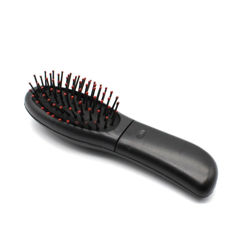 PEIGNE DE MASSAGE ÉLECTRIQUE POUR LES SOINS DES CHEVEUX
