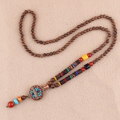 LONG PENDENTIF ET COLLIER PERLÉS EN BOIS DE MALA