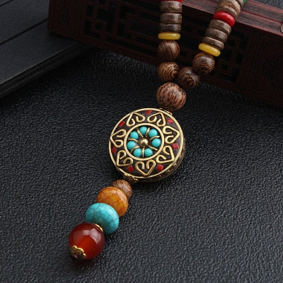 LONG PENDENTIF ET COLLIER PERLÉS EN BOIS DE MALA
