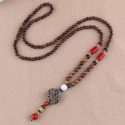 LONG PENDENTIF ET COLLIER PERLÉS EN BOIS DE MALA