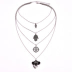 COLLIER BOHÊME FEUILLES MAIN BOUSSOLE ÉLÉPHANT