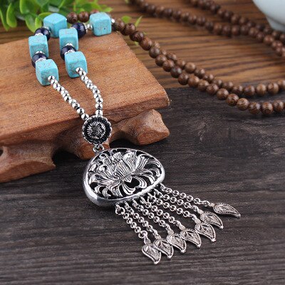 LONG PENDENTIF ET COLLIER PERLÉS EN BOIS DE MALA