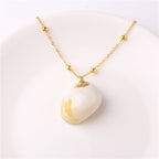 COLLIER BOHO EN COQUILLAGE