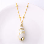 COLLIER BOHO EN COQUILLAGE