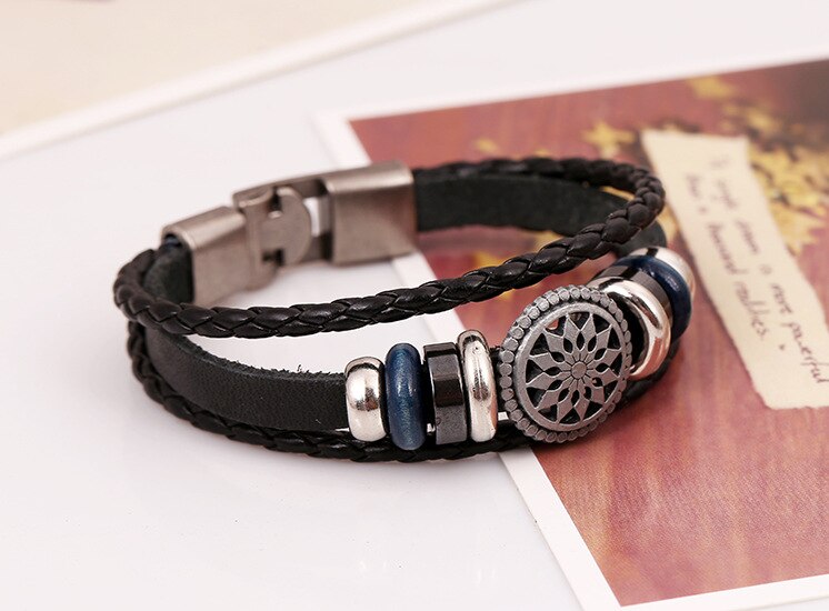 BRACELET EN CUIR TRESSÉ