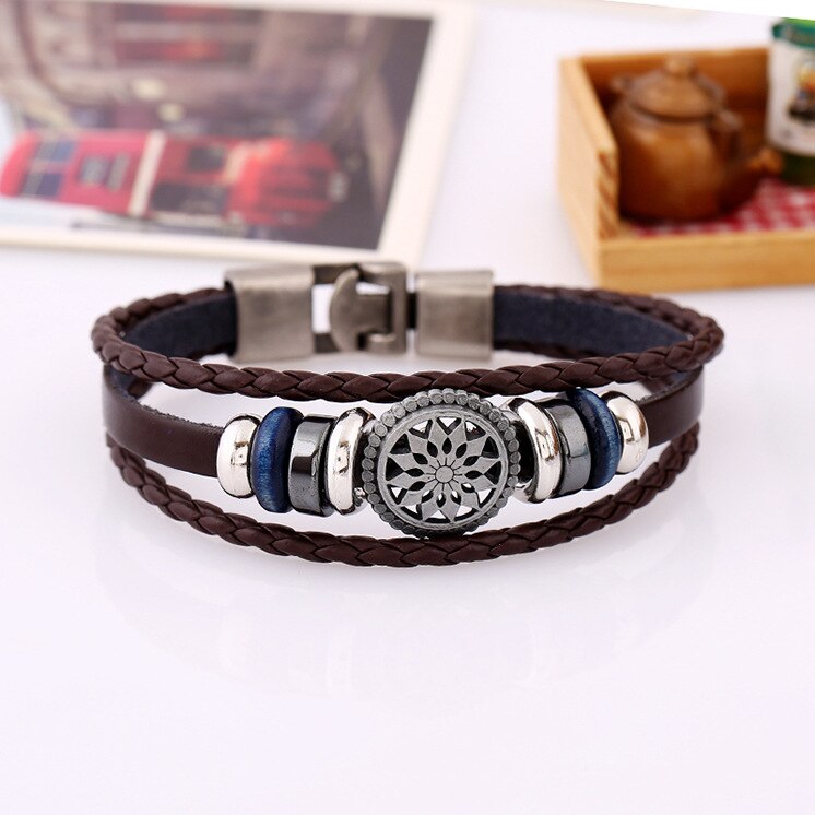 BRACELET EN CUIR TRESSÉ