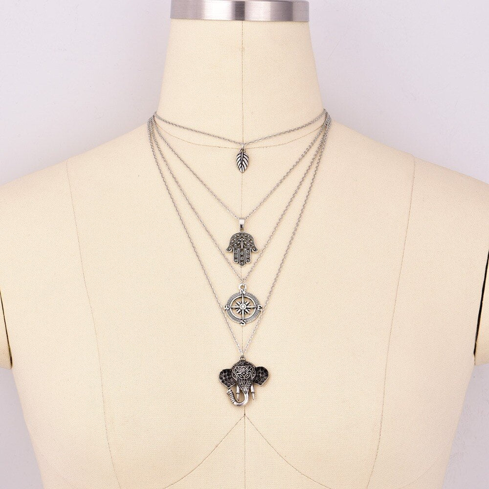 COLLIER BOHÊME FEUILLES MAIN BOUSSOLE ÉLÉPHANT