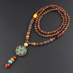 LONG PENDENTIF ET COLLIER PERLÉS EN BOIS DE MALA