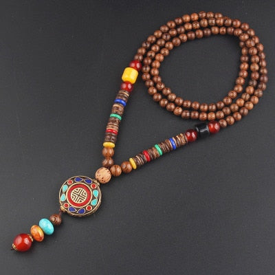 LONG PENDENTIF ET COLLIER PERLÉS EN BOIS DE MALA