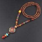 LONG PENDENTIF ET COLLIER PERLÉS EN BOIS DE MALA