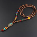 LONG PENDENTIF ET COLLIER PERLÉS EN BOIS DE MALA