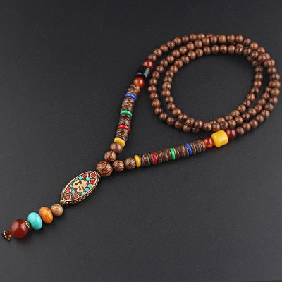 LONG PENDENTIF ET COLLIER PERLÉS EN BOIS DE MALA