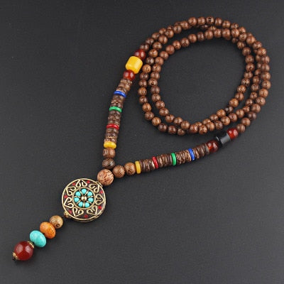 LONG PENDENTIF ET COLLIER PERLÉS EN BOIS DE MALA