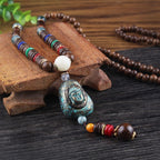LONG PENDENTIF ET COLLIER PERLÉS EN BOIS DE MALA