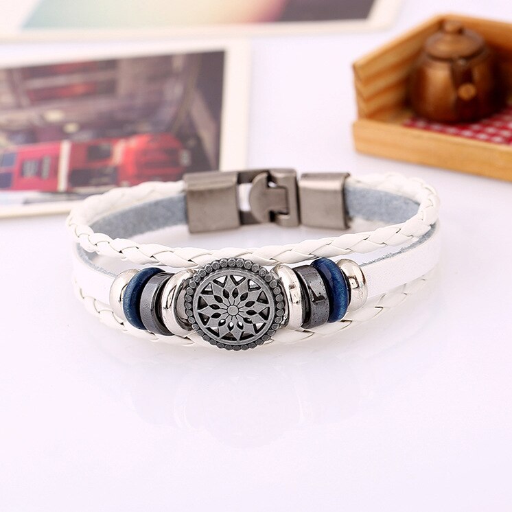 BRACELET EN CUIR TRESSÉ