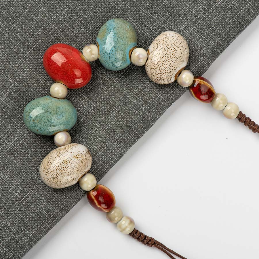 PAVE SHAPED CERAMIC PEARL NECKLACE 