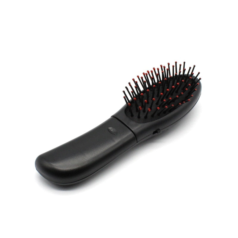 PEIGNE DE MASSAGE ÉLECTRIQUE POUR LES SOINS DES CHEVEUX