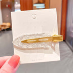 SEAMLESS HAIR CLIP 