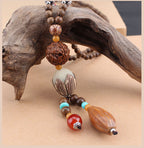 LONG PENDENTIF ET COLLIER PERLÉS EN BOIS DE MALA