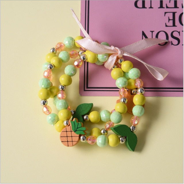 BRACELET DE PERLES EN BOIS POUR ENFANTS - BOSSOUASHOP