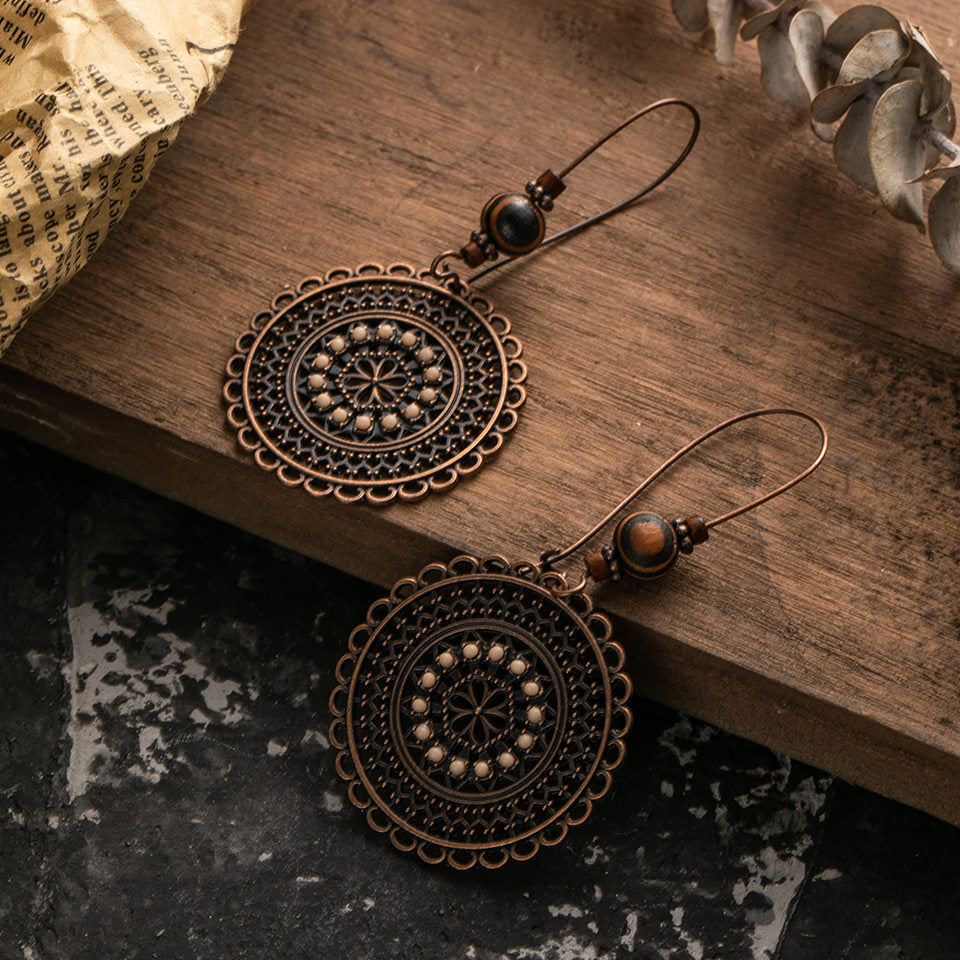 BOUCLES D'OREILLES VINTAGE EN CREUX ETHNIQUE - BOSSOUASHOP