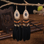 BOUCLES D'OREILLES BOHEMIENNES EN PLUMES - BOSSOUASHOP