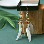 BOUCLES D'OREILLES BOHEMIENNES EN PLUMES - BOSSOUASHOP