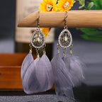 BOUCLES D'OREILLES BOHEMIENNES EN PLUMES - BOSSOUASHOP