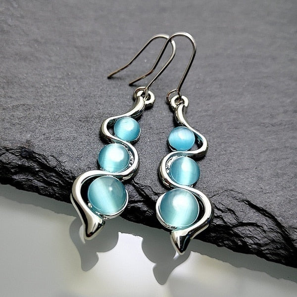 BOUCLES D'OREILLES 4 COULEURS - BOSSOUASHOP